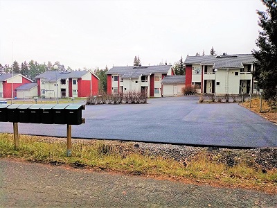 Newly asphalted yard and parking lot of Petäjäkuja property